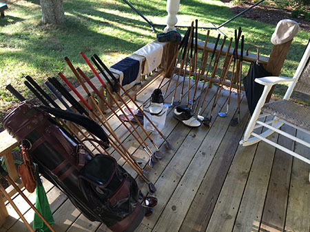 Clubs, shoes, hats – all drying out on the McNabb Cottage porch.