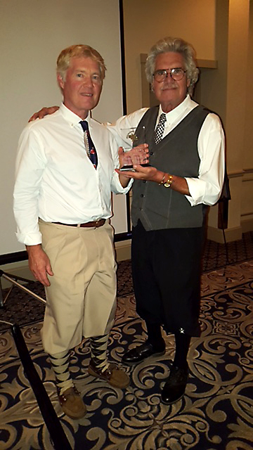 Bill Reed, right, congratulates Randy Jensen on his induction into the Nebraska Hickory Golf Hall of Fame.